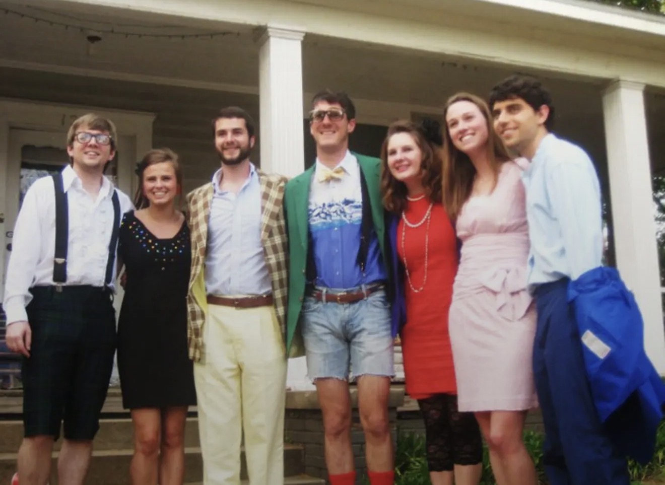 Friends crowded together on the front steps of 120 Springdale